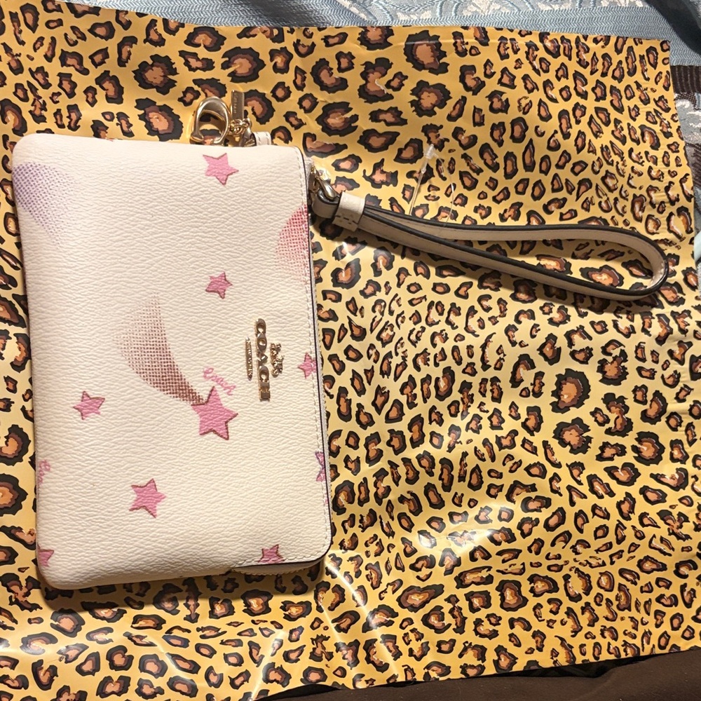 Coach White Leather Wristlet with Pink Star Motif